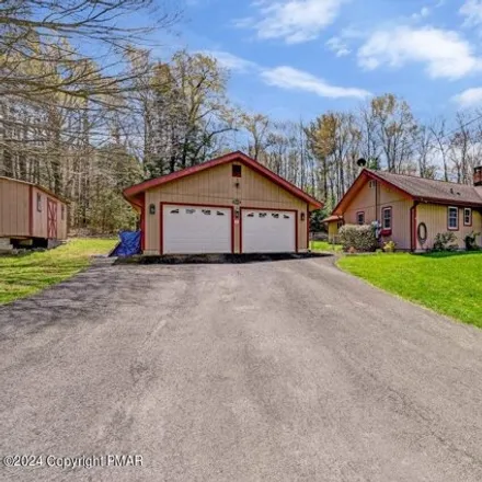 Buy this 4 bed house on 3393 Mountain Laurel Lane in Pocono Pines, Tobyhanna Township