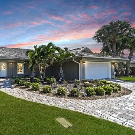 Buy this 4 bed house on 3099 Rio Baya South in Melbourne, FL 32903