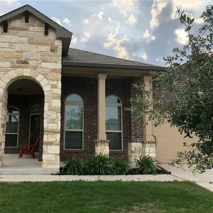 Rent this 4 bed house on 947 Canvasback Creek Drive in Leander, TX 78641