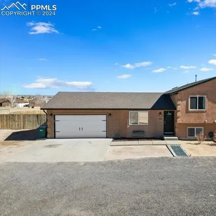 Buy this 4 bed house on 1158 South Los Charros Drive in Pueblo County, CO 81007