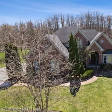 Buy this 5 bed house on 2073 Wildflower Lane in Highland Charter Township, MI 48380