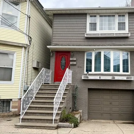 Rent this 2 bed house on 340 Hamilton Street in Harrison, NJ 07029