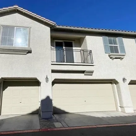 Buy this 2 bed townhouse on 9198 Kona Peaks Court in Las Vegas, NV 89149