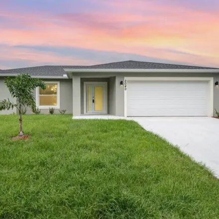 Buy this 3 bed house on 2036 Waverly Avenue Southeast in Palm Bay, FL 32909
