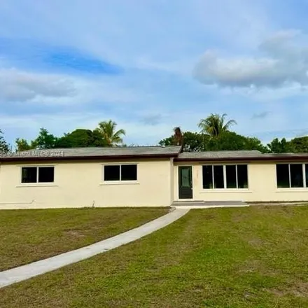 Buy this 4 bed house on 1509 Northwest 11th Avenue in Middle River Vista, Fort Lauderdale