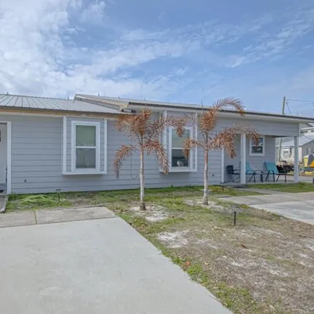 Buy this 6 bed house on 6227 Orange Plaza in Upper Grand Lagoon, FL 32408
