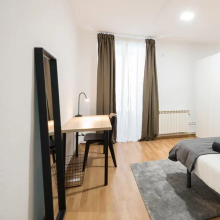 Rent this 11 bed room on Calle de Cedaceros in 8, 28014 Madrid