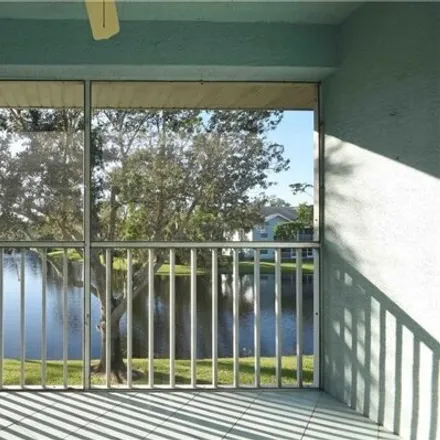 Image 1 - 150 Wading Bird Circle, Palm River, Collier County, FL 34110, USA - Condo for rent