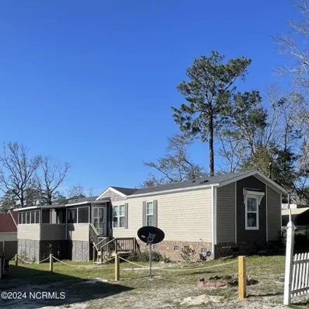 Buy this studio apartment on 2877 Pirate Lane Southwest in Brunswick County, NC 28462