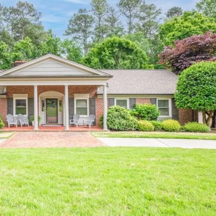 Buy this 5 bed house on 4905 Hermitage Drive in Raleigh, NC 27612