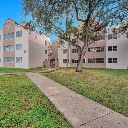 Buy this 3 bed condo on 6065 Northwest 186th Street in Miami-Dade County, FL 33015