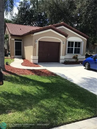 Rent this 3 bed house on 4298 Northwest 1st Place in Deerfield Beach, FL 33442