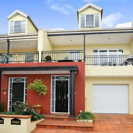 Rent this 3 bed townhouse on Clifford Place in Clifton Hill VIC 3068, Australia