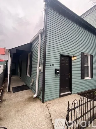 Rent this 2 bed house on 224 W 5th St