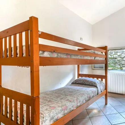 Rent this 3 bed house on 57038 Rio Marina LI