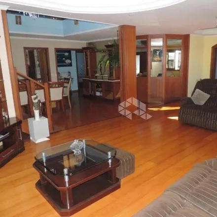 Buy this 4 bed house on Rua Maria Elaine Wotter in Parque Santa Fé, Porto Alegre - RS