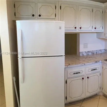 Rent this 2 bed condo on Posh French Cleaners in Southwest Natura Boulevard, Carver Heights