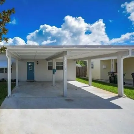 Buy this 3 bed house on 1156 North E Street in Lake Worth Beach, FL 33460