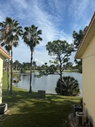 Buy this 2 bed condo on 1648 Windorah Way in Golden Lakes, Palm Beach County