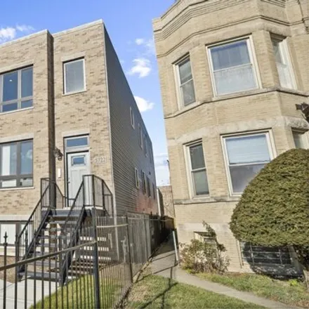 Rent this 3 bed apartment on 5722 W Race Ave Unit 3 in Chicago, Illinois