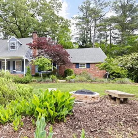 Buy this 4 bed house on 610 Caswell Road in Estes Hills, Chapel Hill