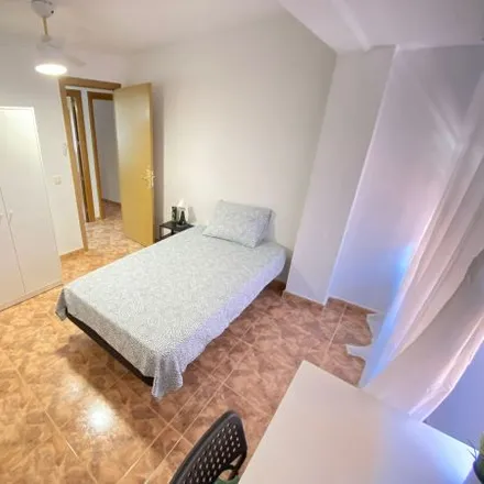 Rent this 3 bed room on Calle de Graena in 28041 Madrid, Spain