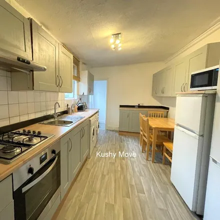 Rent this 4 bed townhouse on Barset Community Hall in Buchan Road, London