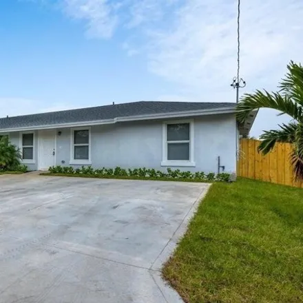 Rent this 3 bed house on 5185 Clouse Road in Palm Beach County, FL 33417