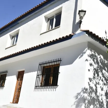 Rent this 4 bed house on Camino del Río Genil in 18190 Cenes de la Vega, Spain