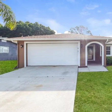 Rent this 3 bed house on 998 Kentucky Avenue in Rockledge, FL 32955