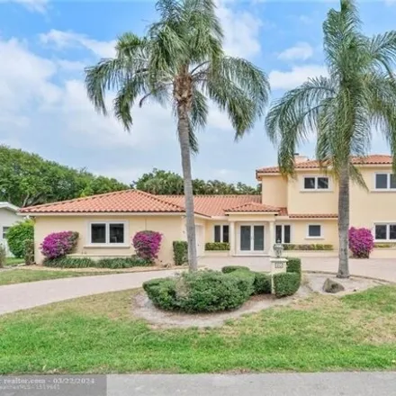 Rent this 4 bed house on 68 Saranac Road in Sea Ranch Lakes, Broward County