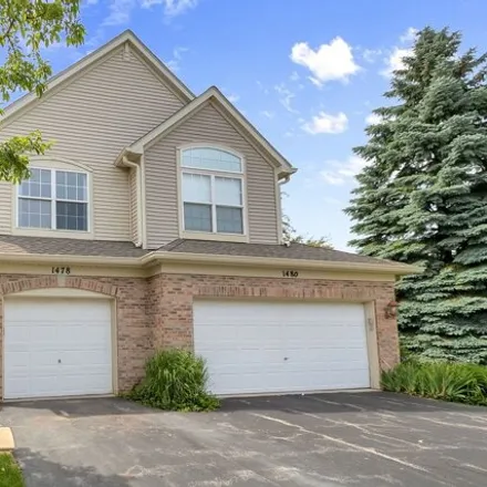 Buy this 2 bed townhouse on 1478 Doolittle Ln in Grayslake, Illinois