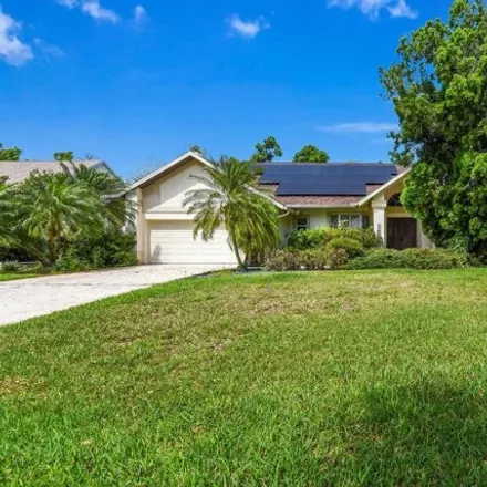 Buy this 4 bed house on 11689 Timberline Circle in Lee County, FL 33966