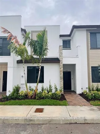 Rent this 3 bed townhouse on 940 Northeast 212th Terrace in Miami-Dade County, FL 33179