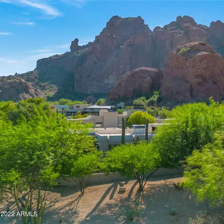 Buy this 4 bed house on 5680 North Echo Canyon Drive in Phoenix, AZ 85018