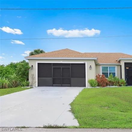 Buy this 3 bed house on 909 Alfreda Avenue in Lehigh Acres, FL 33971