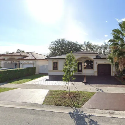 Buy this 4 bed house on 8911 Northwest 153rd Terrace in Miami Lakes, FL 33018