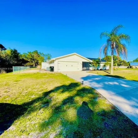 Buy this 4 bed house on 1079 Southeast Preston Lane in Port Saint Lucie, FL 34983
