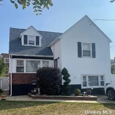 Buy this 4 bed house on 98-14 158th Avenue in New York, NY 11414