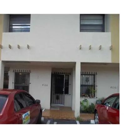 Rent this 2 bed townhouse on 4100 West 14th Avenue in Strawberry Village Trailer Park, Hialeah