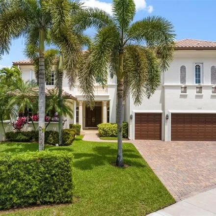 Rent this 6 bed house on 10501 Blue Palm Street in Plantation, FL 33324