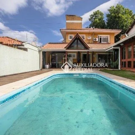 Buy this 3 bed house on Rua Líbia in Vila Ipiranga, Porto Alegre - RS