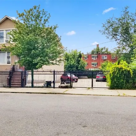 Buy this 6 bed townhouse on 609 Saint Lawrence Avenue in New York, NY 10473