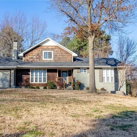 Buy this 4 bed house on 1326 East Sunny Hill Drive in Fayetteville, AR 72703