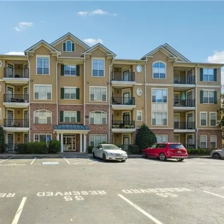 Buy this 2 bed condo on Irvin Court in Scottdale, GA 30030
