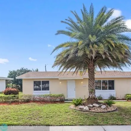 Buy this 3 bed house on 4372 Northwest 10th Street in Coconut Creek Park, Coconut Creek