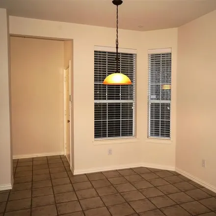 Rent this 3 bed townhouse on 3258 Rolling Meadow Drive in Plano, TX 75025