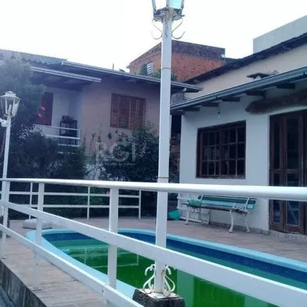 Buy this 6 bed house on Rua Ângelo Passuelo in Vila Nova, Porto Alegre - RS