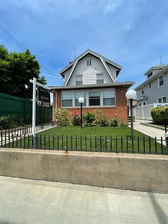 Buy this 6 bed house on 3903 Farragut Road in New York, NY 11210