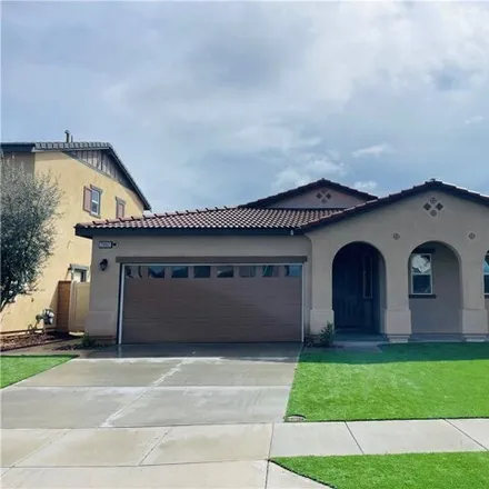 Rent this 4 bed house on Western Front Drive in Menifee, CA 92587